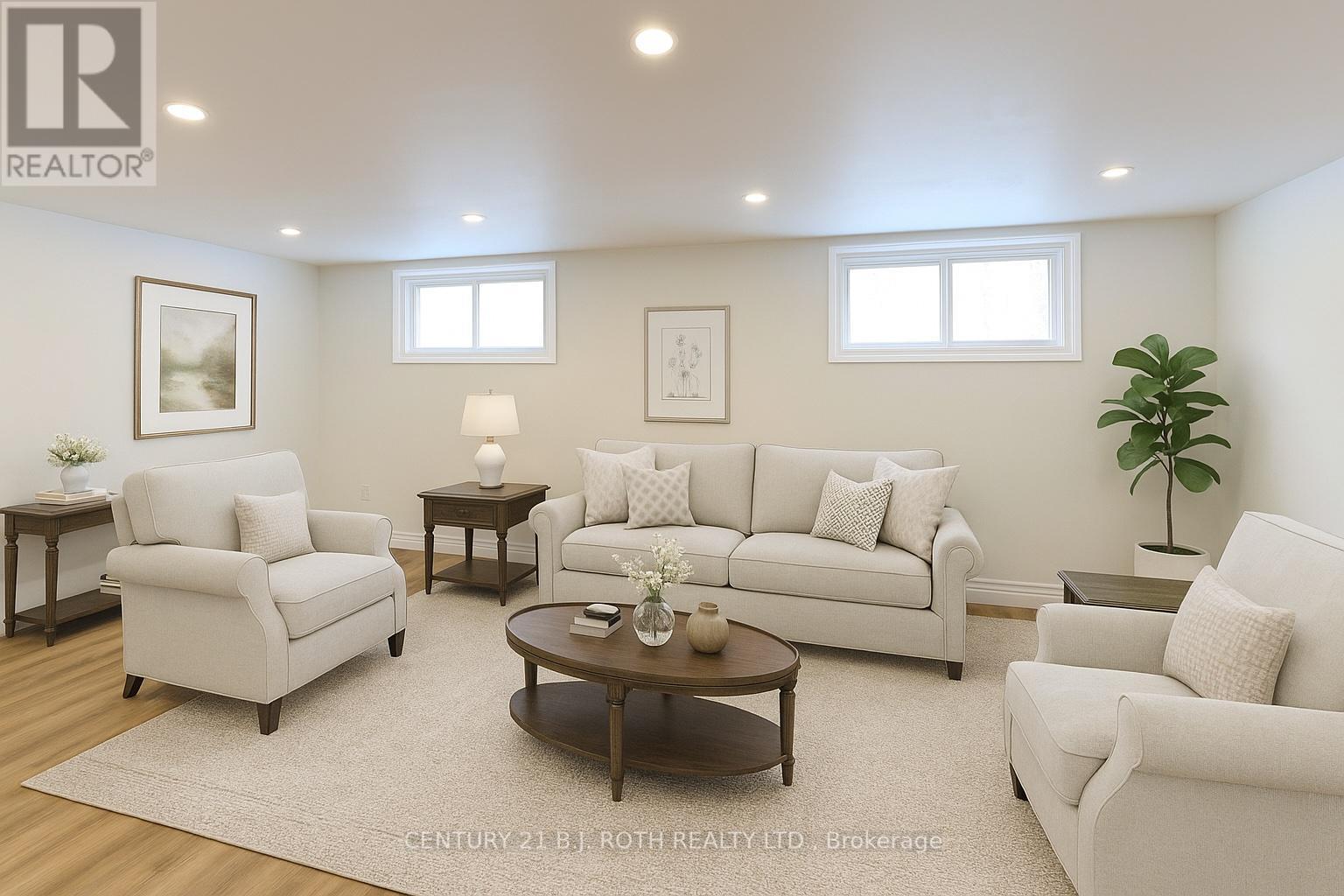 Image has been virtually staged - 201 Point Street, Clearview, ON - Indoor Photo Showing Living Room