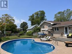 Summer view of backyard provided by seller -