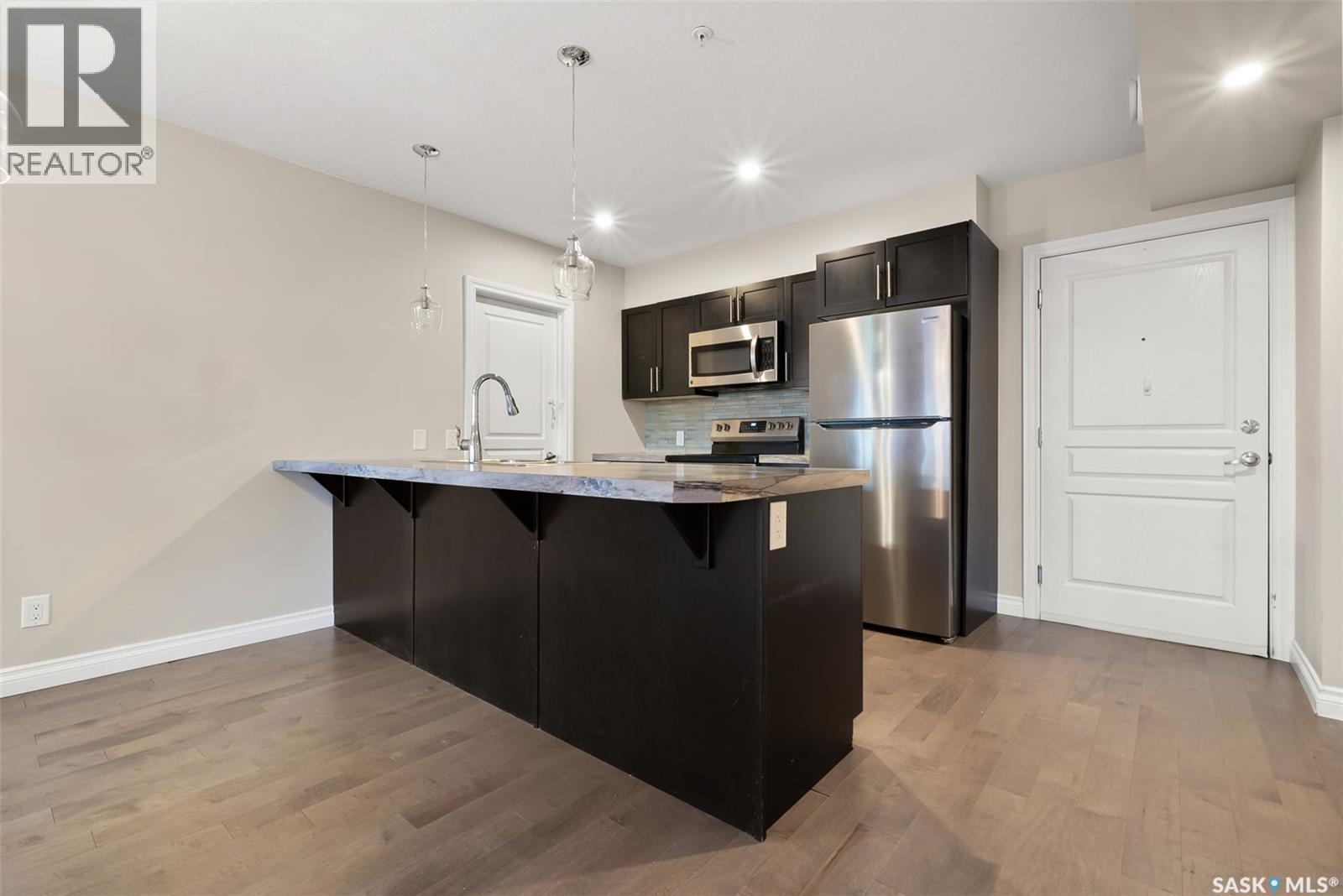 103 5303 Universal Crescent, Regina, SK - Indoor Photo Showing Kitchen