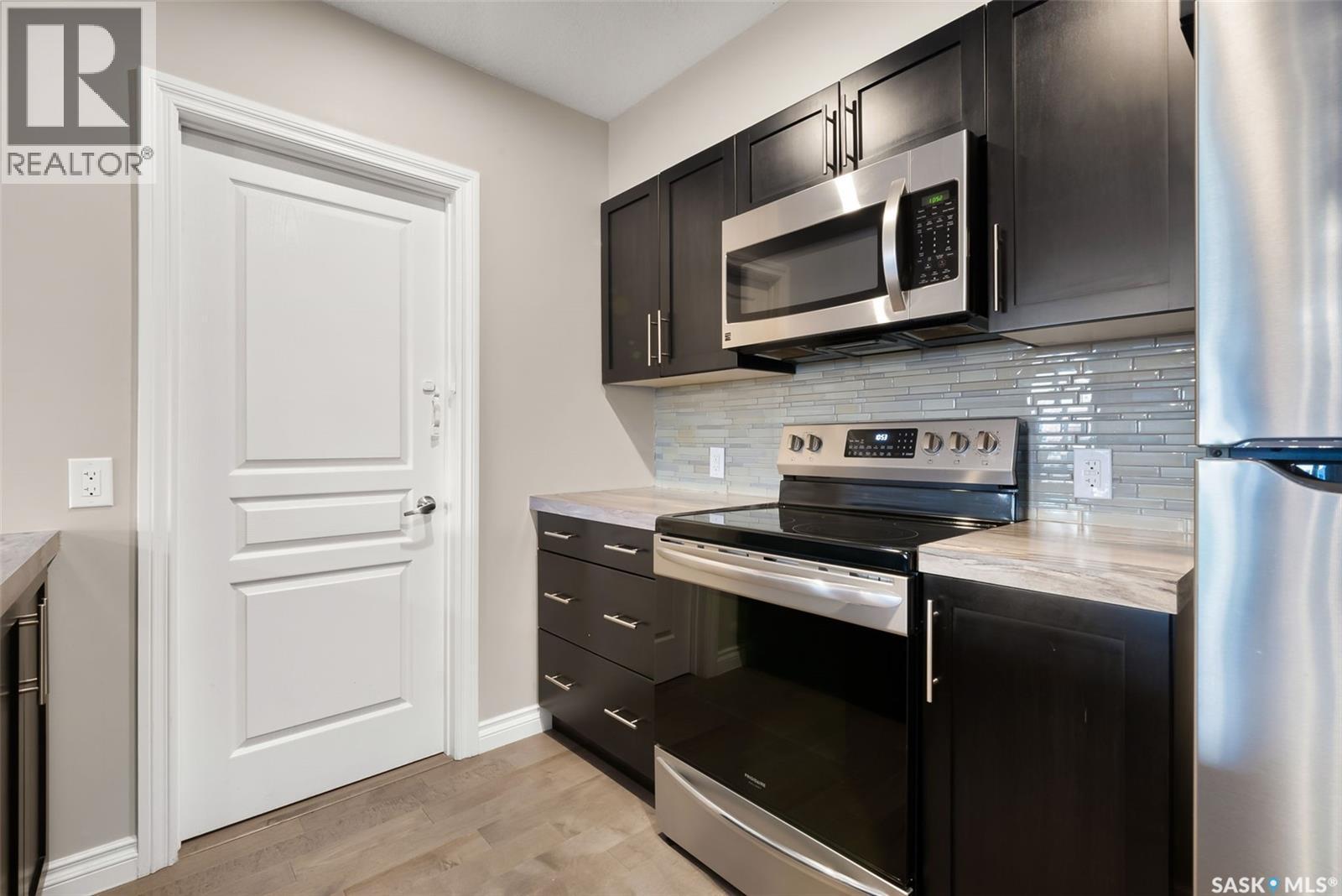 103 5303 Universal Crescent, Regina, SK - Indoor Photo Showing Kitchen