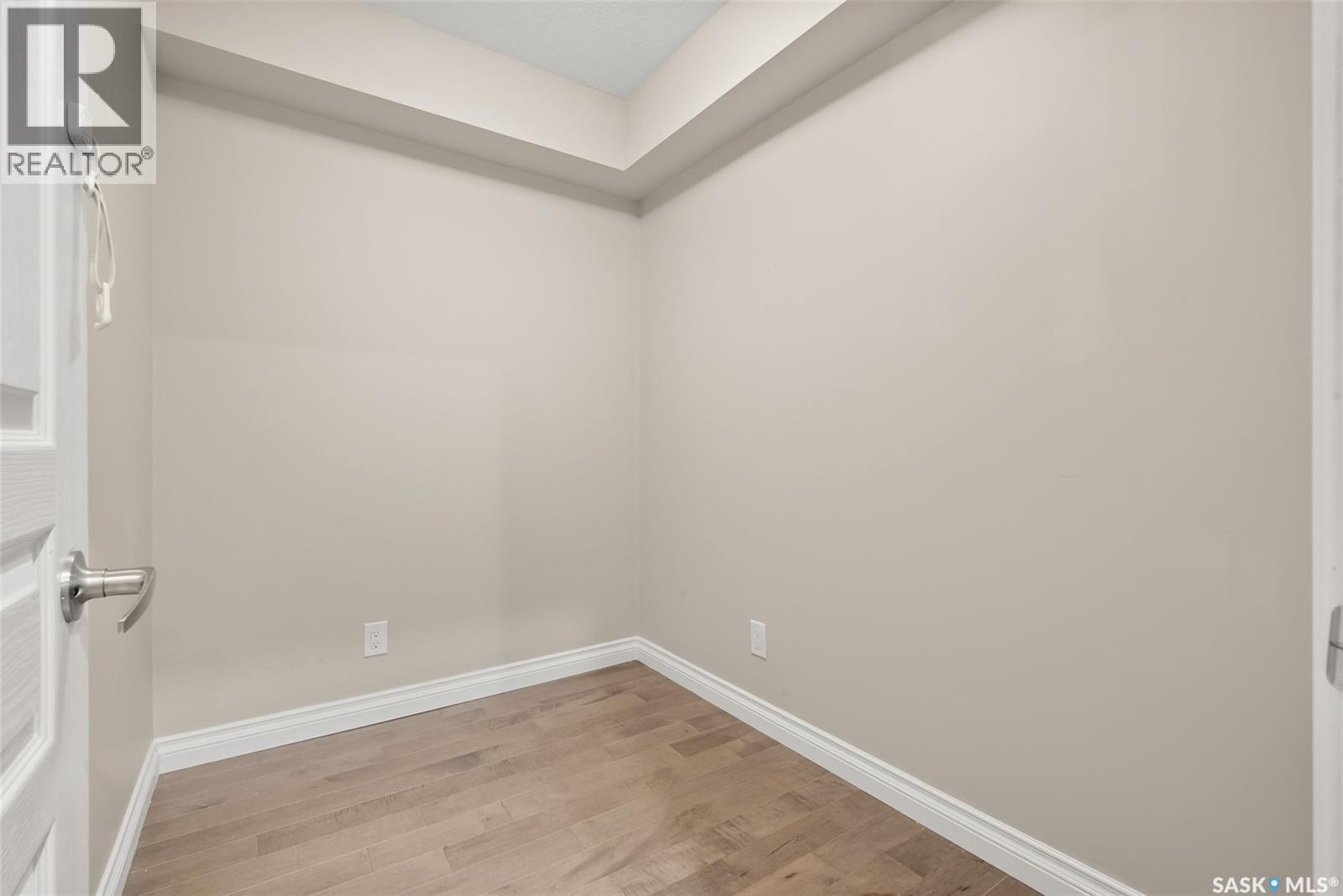 103 5303 Universal Crescent, Regina, SK - Indoor Photo Showing Other Room