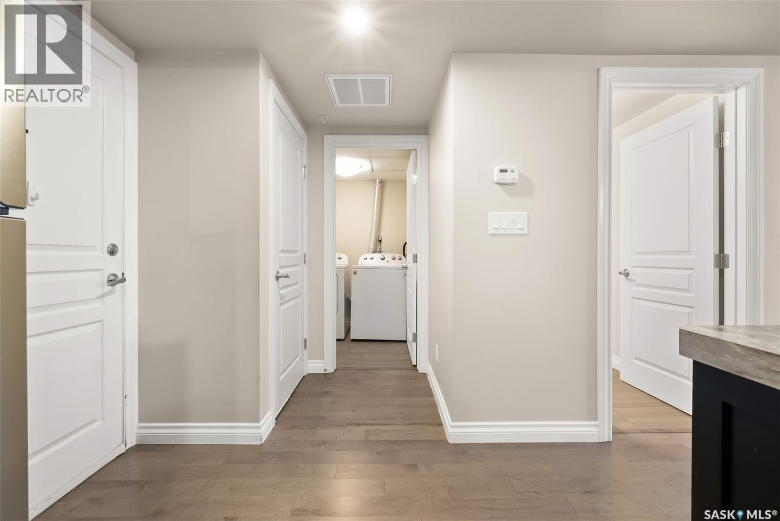 103 5303 Universal Crescent, Regina, SK - Indoor Photo Showing Other Room