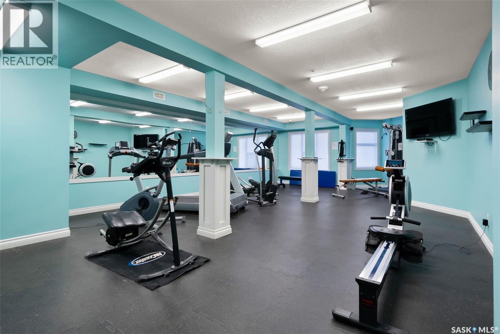 103 5303 Universal Crescent, Regina, SK - Indoor Photo Showing Gym Room