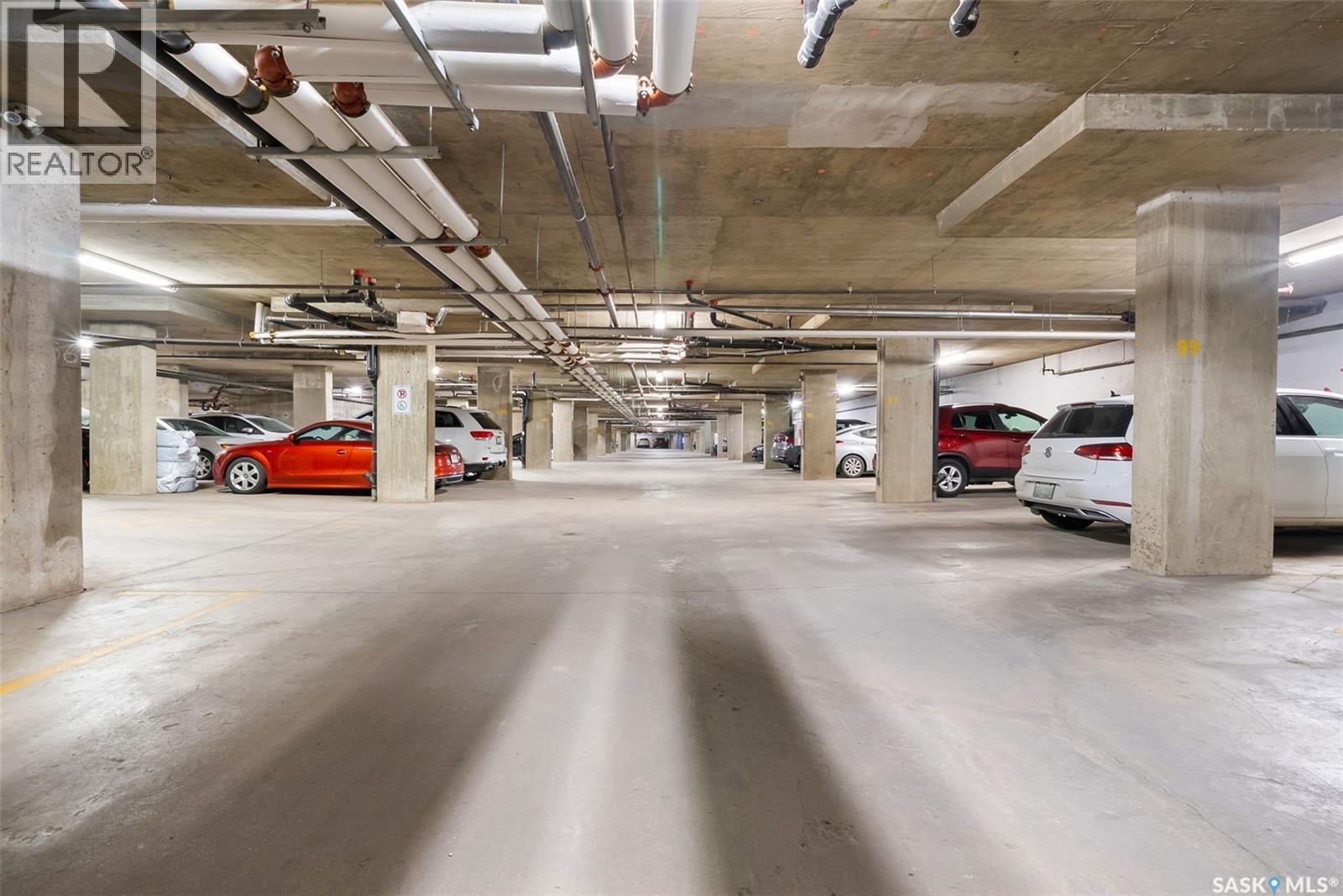 103 5303 Universal Crescent, Regina, SK - Indoor Photo Showing Garage