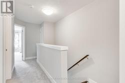 3rd level hallway with linen closet at end -
