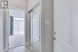Mirrored Closet doors & inside garage entry. -