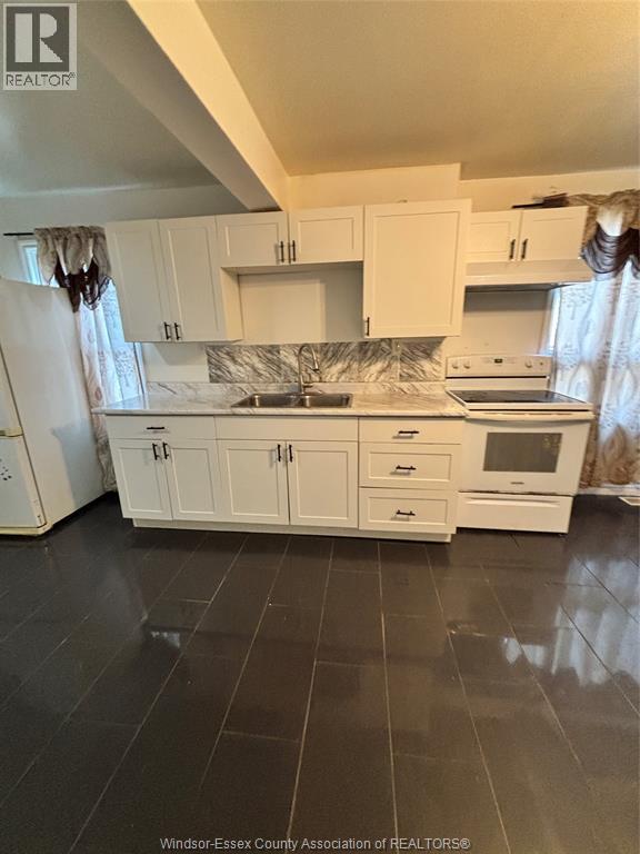 768 Brant, Windsor, ON - Indoor Photo Showing Kitchen With Double Sink