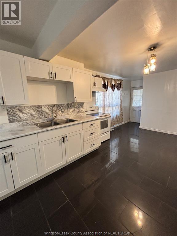 768 Brant, Windsor, ON - Indoor Photo Showing Kitchen With Double Sink