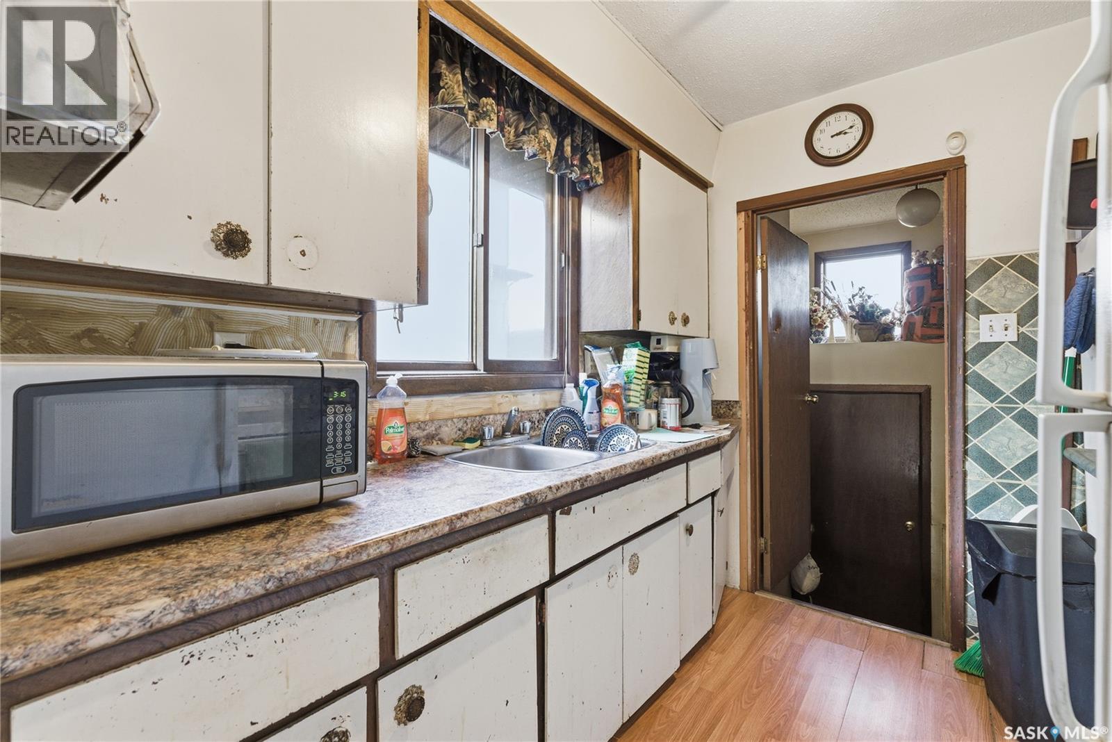 1109 7Th Street E, Saskatoon, SK - Indoor Photo Showing Kitchen With Double Sink