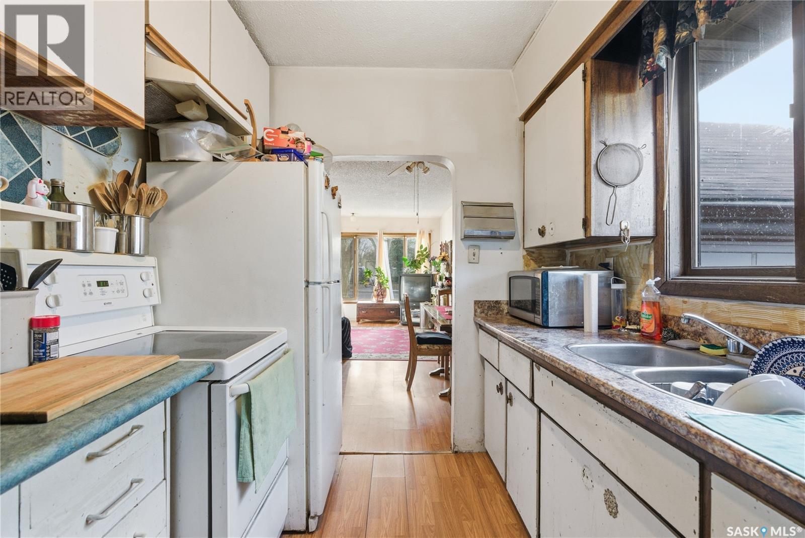 1109 7Th Street E, Saskatoon, SK - Indoor Photo Showing Kitchen With Double Sink