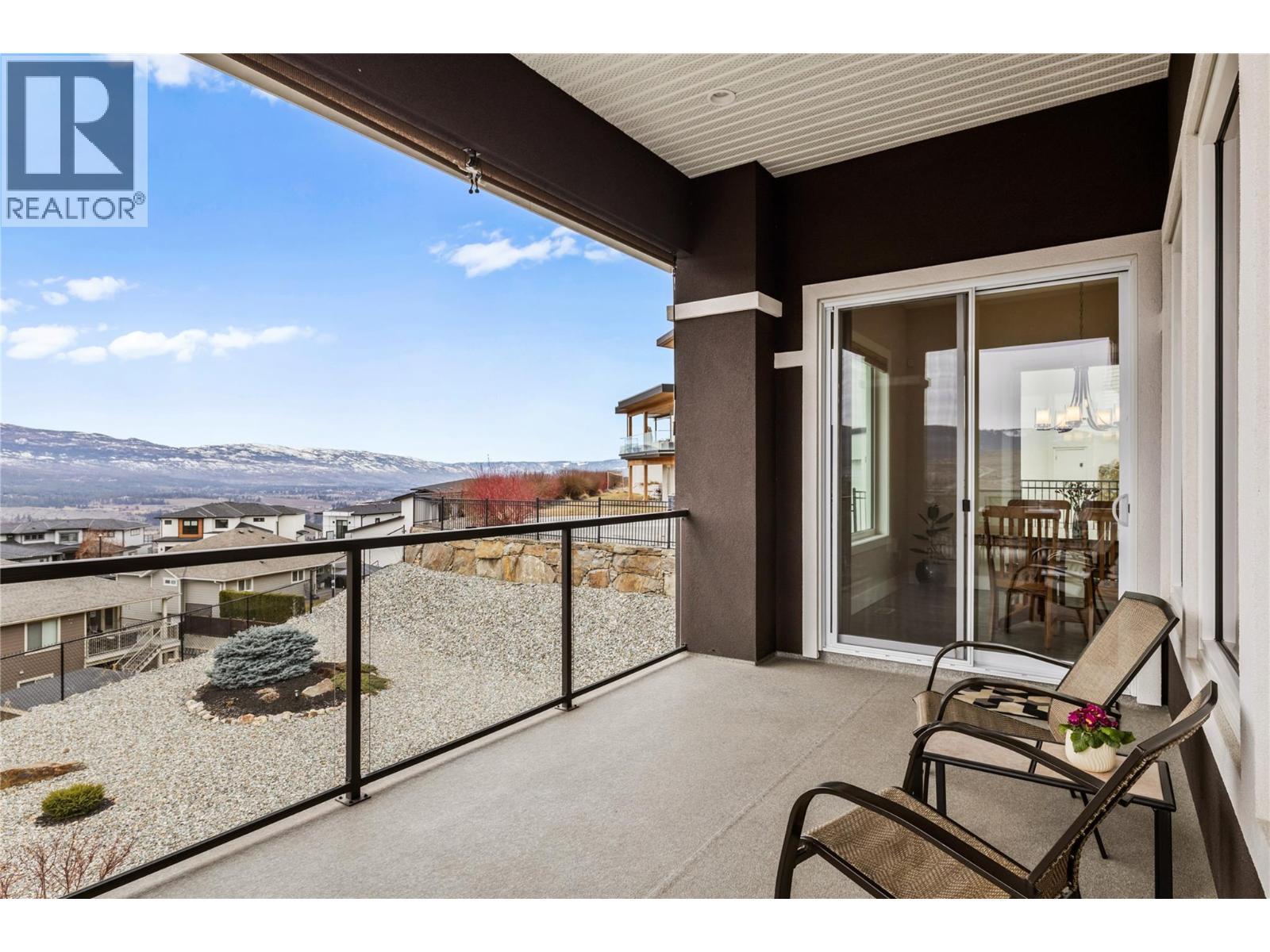 Patio on upper level, off of main living and dining areas. - 1376 Mine Hill Drive, Kelowna, BC - Outdoor With Exterior