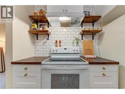 Full Kitchen Renovation included Butcher Block Countertops, Farm Sink, New Faucets and hardware, cabinets and new appliances! -