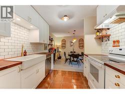 Full Kitchen Renovation included Butcher Block Countertops, Farm Sink, New Faucets and hardware, cabinets and new appliances! -