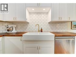 Full Kitchen Renovation included Butcher Block Countertops, Farm Sink, New Faucets and hardware, cabinets and new appliances! -