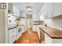 Full Kitchen Renovation included Butcher Block Countertops, Farm Sink, New Faucets and hardware, cabinets and new appliances! -