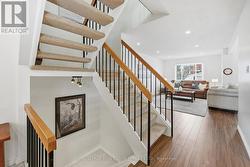Open-Riser Staircase to the Upper Level -