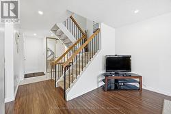 Open-Riser Staircase to the Upper Level -