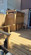 Enjoy a Fully Fenced Backyard with a Custom Deck -