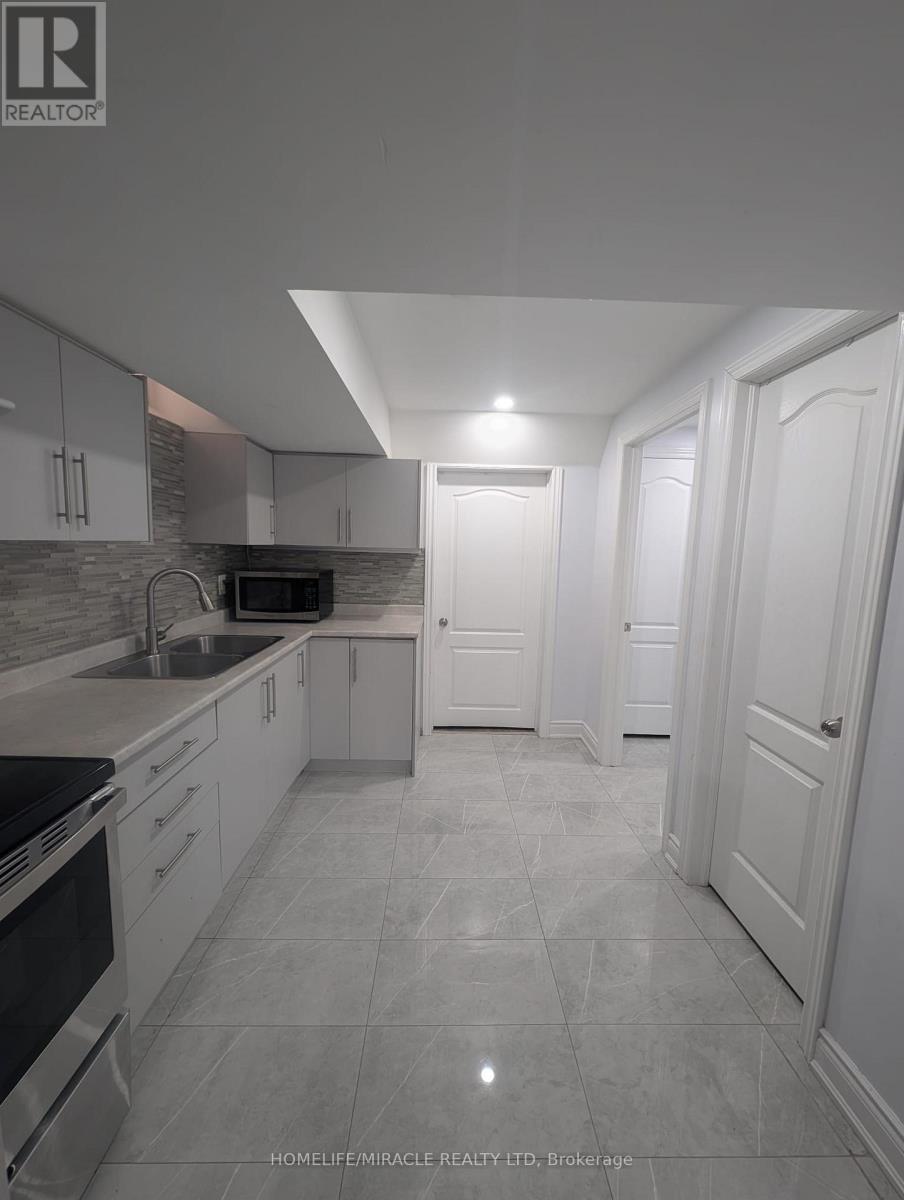 Lower - 67 Herdwick Street, Brampton, ON - Indoor Photo Showing Kitchen With Double Sink