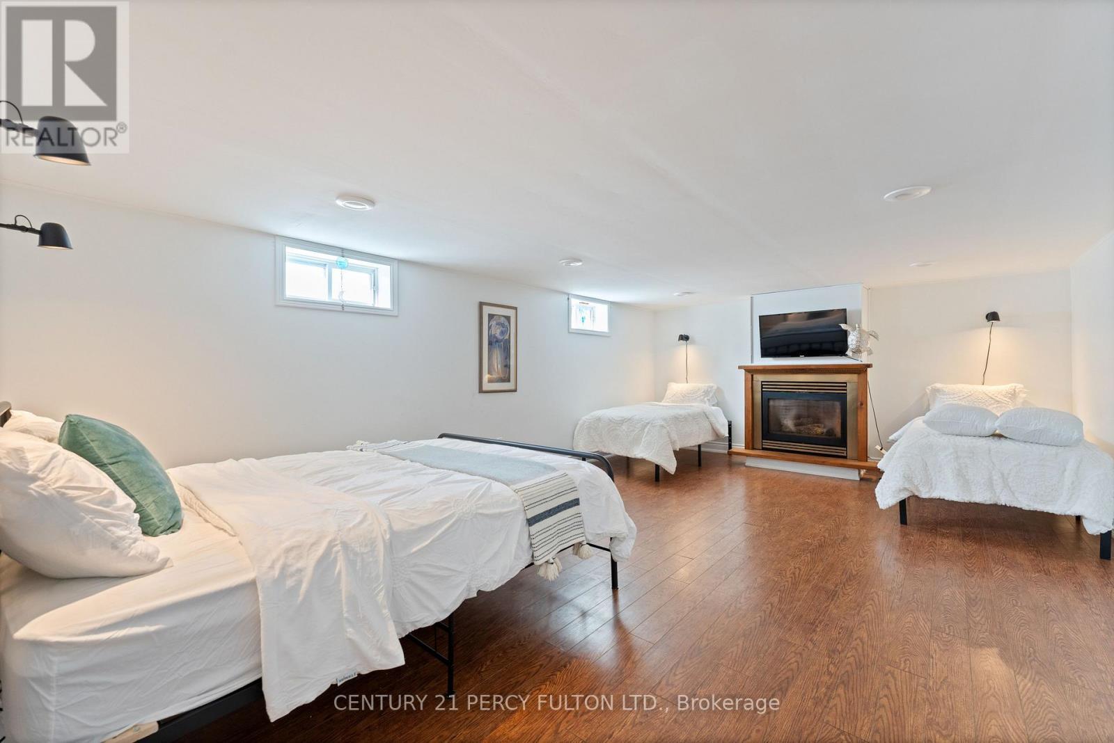 5659 Gilmore Road, Clarington, ON - Indoor Photo Showing Bedroom With Fireplace