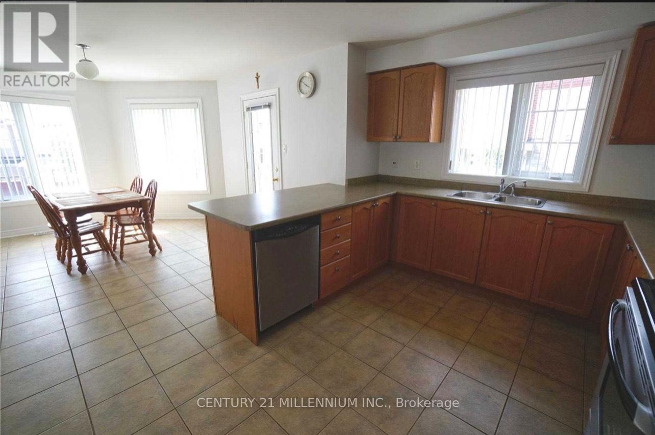 Upper - 23 Pefferlaw Circle, Brampton, ON - Indoor Photo Showing Kitchen With Double Sink