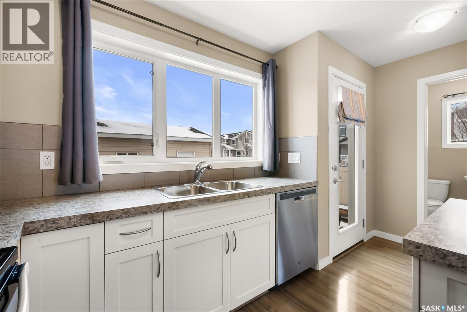 5057 Cornell Gate, Regina, SK - Indoor Photo Showing Kitchen With Double Sink