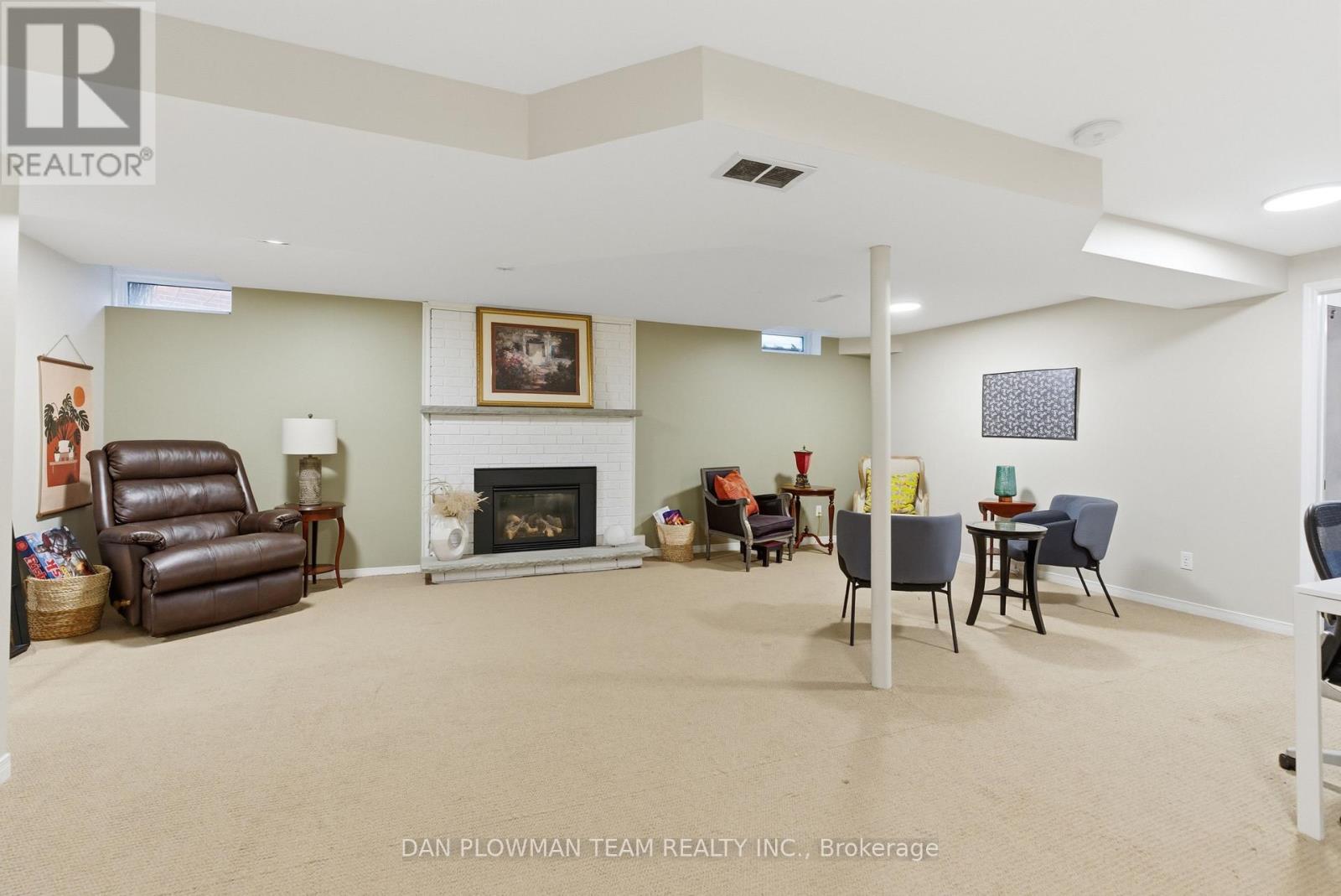 8 Aldcroft Crescent, Clarington, ON - Indoor Photo Showing Basement With Fireplace