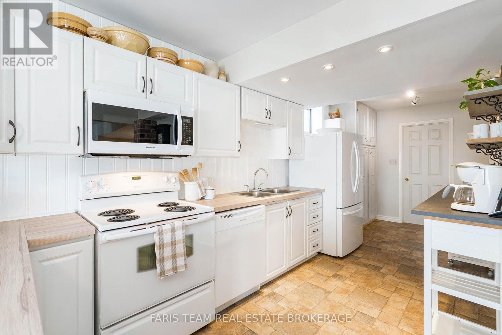 238 Robins Point Road, Tay, ON - Indoor Photo Showing Kitchen With Double Sink