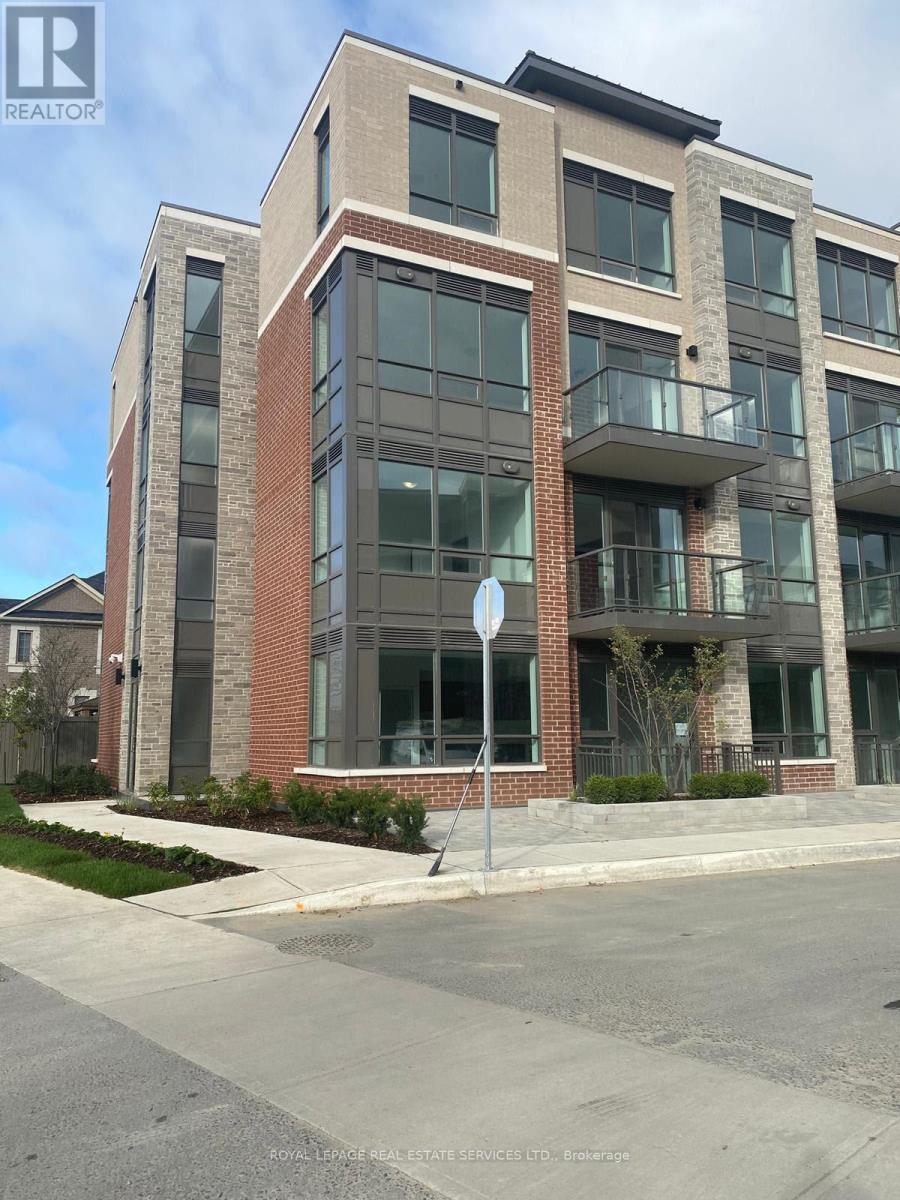 260 - 65 Attmar Drive, Brampton, ON - Outdoor With Facade