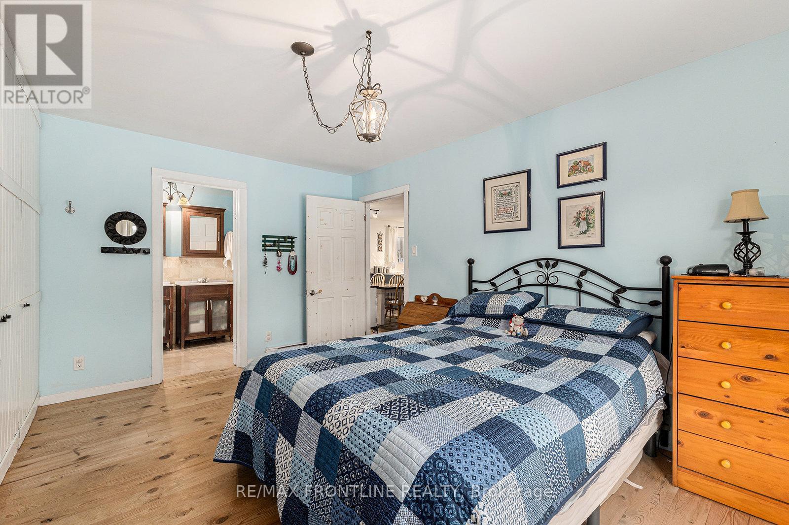 242 Maberly Station Road Nw, Tay Valley, ON - Indoor Photo Showing Bedroom
