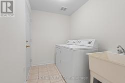 Laundry with access to the Garage -
