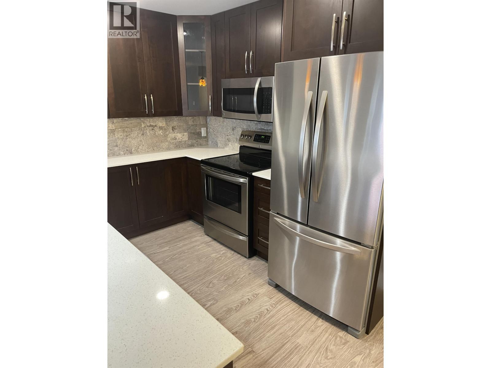 119 2055 Ingledew Street, Prince George, BC - Indoor Photo Showing Kitchen With Stainless Steel Kitchen With Upgraded Kitchen