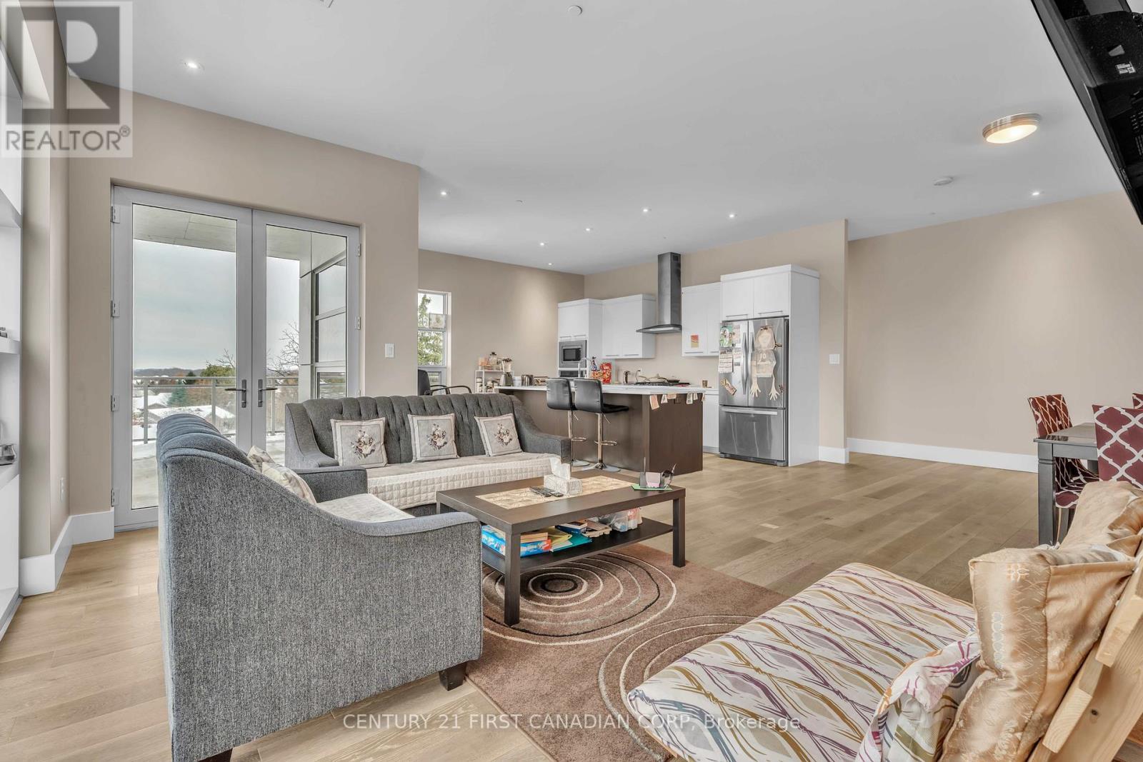 303 - 1705 Fiddlehead Place, London North (North R), ON - Indoor Photo Showing Living Room