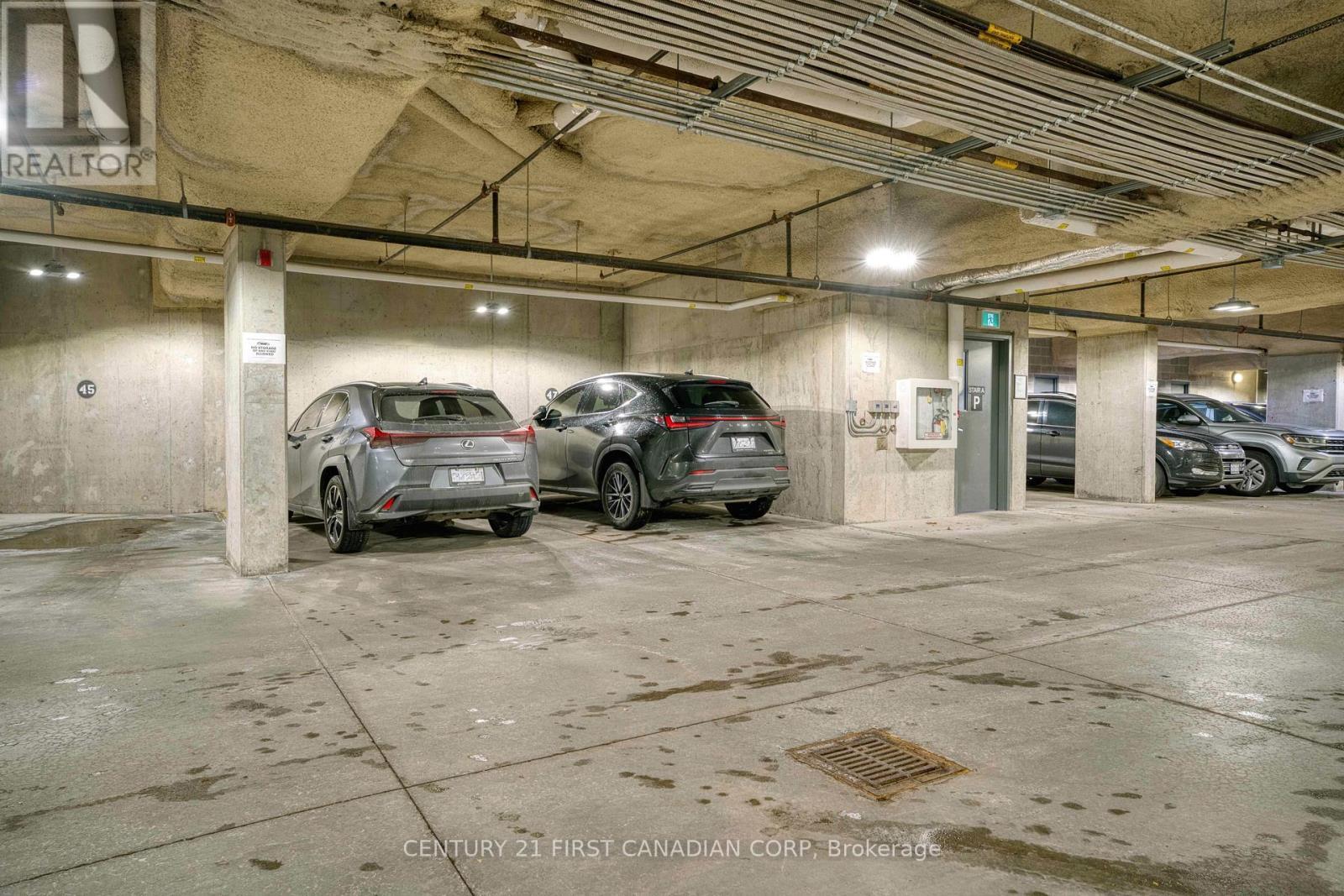 303 - 1705 Fiddlehead Place, London North (North R), ON - Indoor Photo Showing Garage