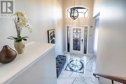 Breathtaking Foyer with 13th ft Ceilings! -