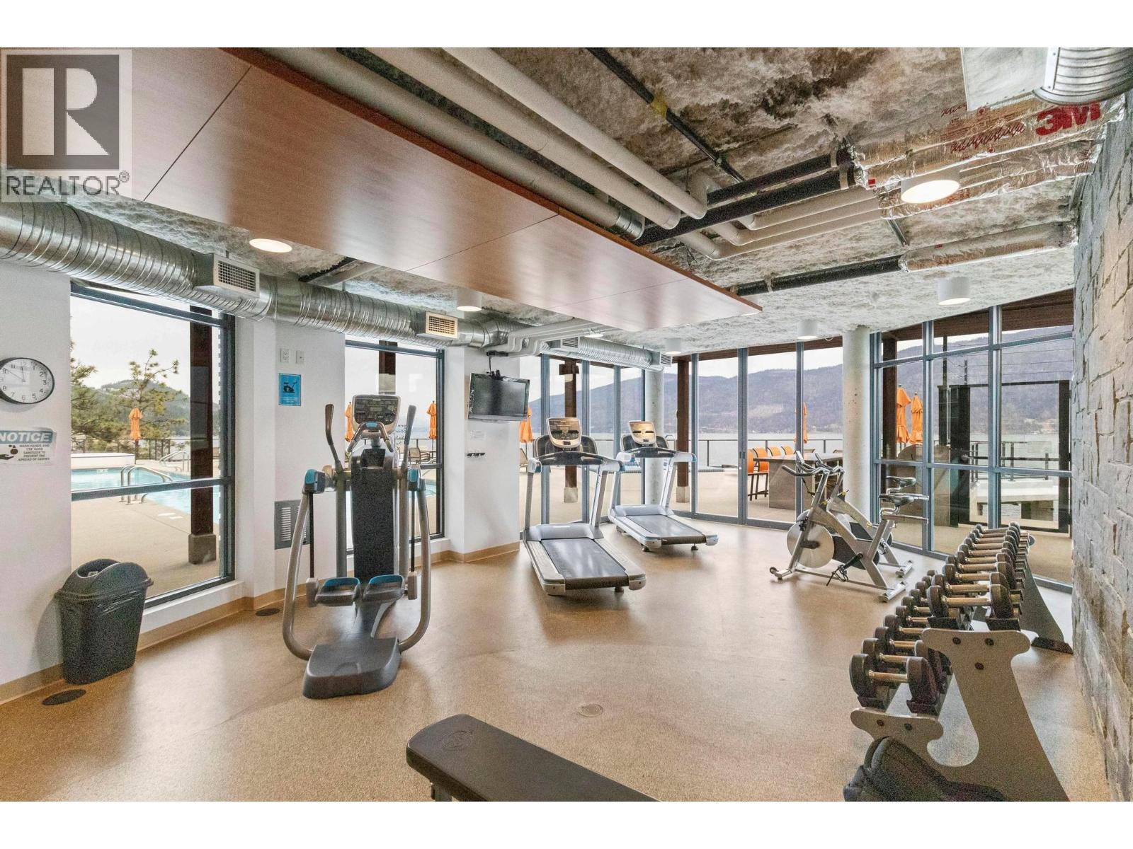 Lake Club Amenity Centre - 1768 Slateview Crescent, Lake Country, BC - Indoor Photo Showing Gym Room