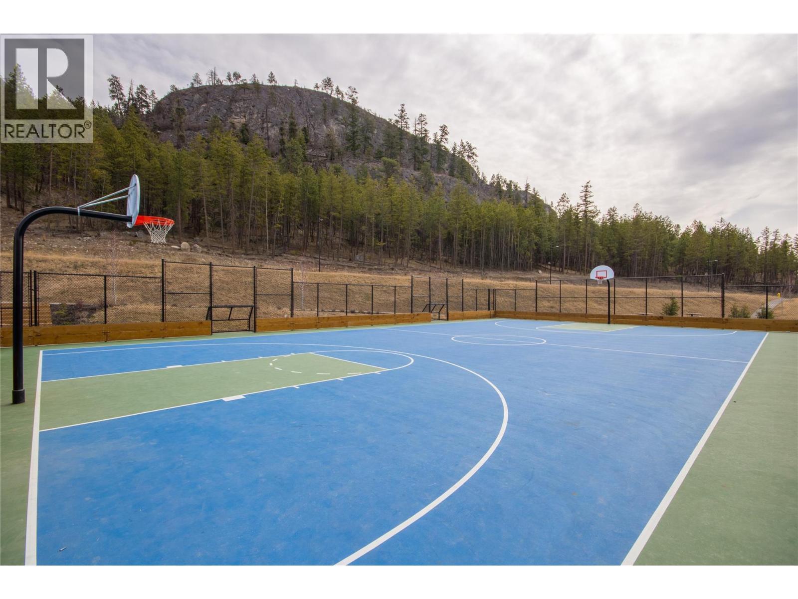 Multi Sport Court - 1768 Slateview Crescent, Lake Country, BC - Outdoor With Backyard