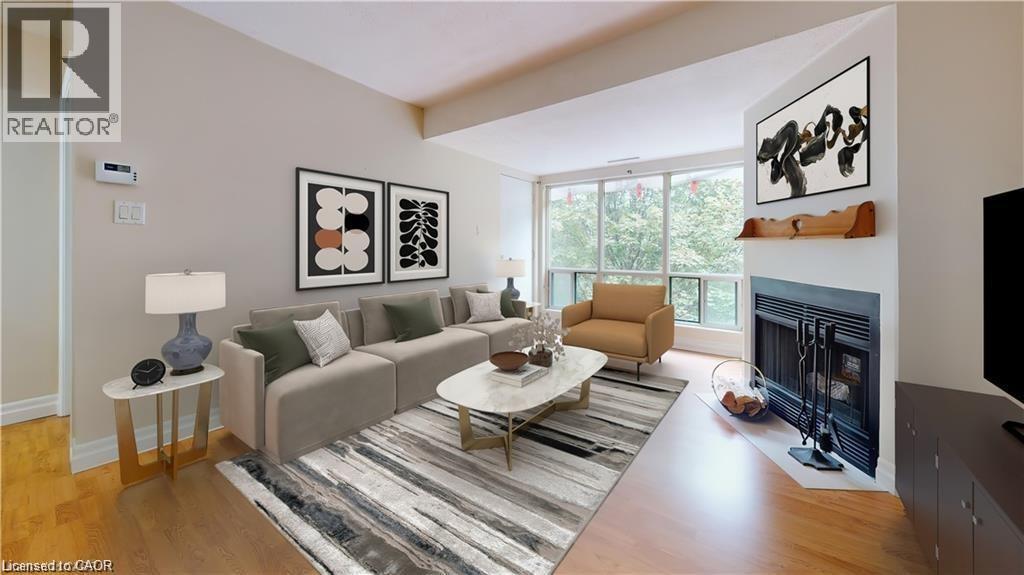 15 Hofstetter Avenue Unit# 403, Kitchener, ON - Indoor Photo Showing Living Room With Fireplace