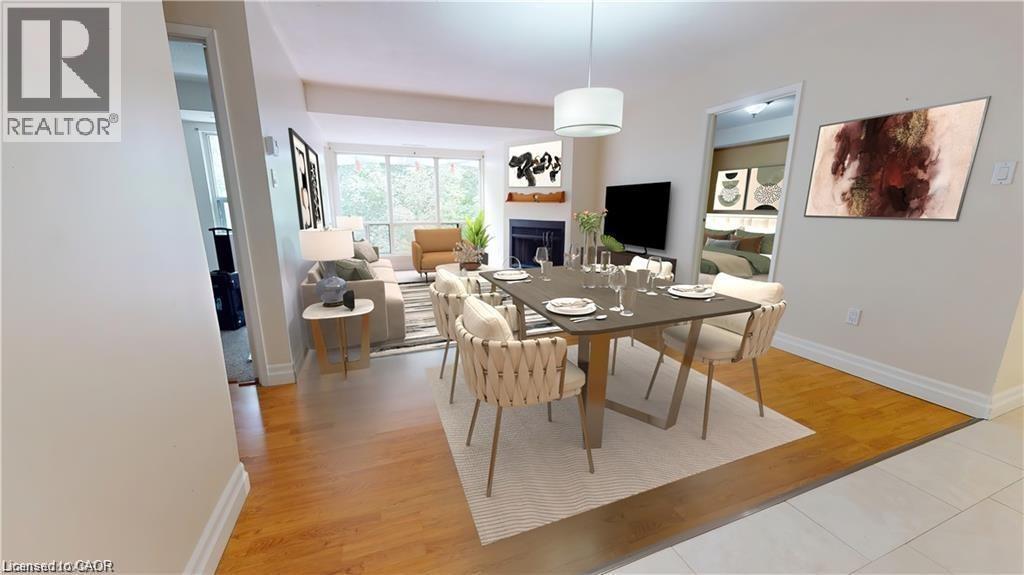 15 Hofstetter Avenue Unit# 403, Kitchener, ON - Indoor Photo Showing Dining Room With Fireplace
