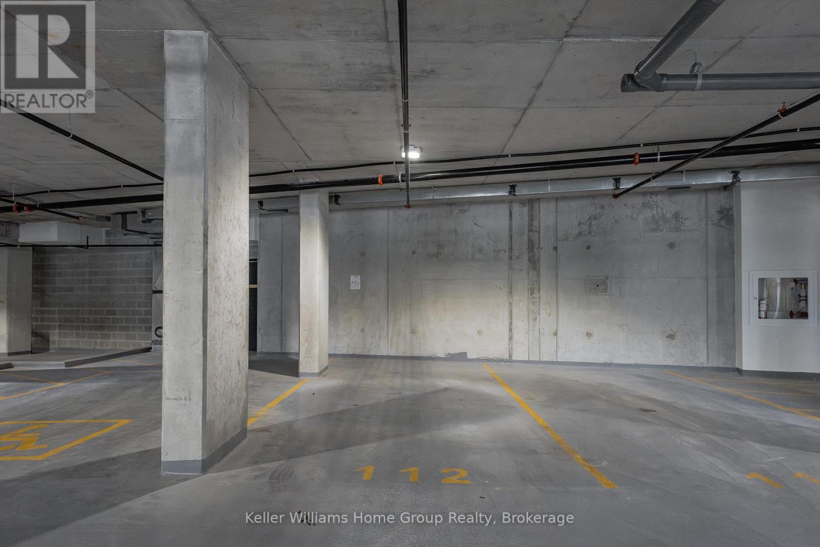 714 - 93 Arthur Street, Guelph (St. Patrick'S Ward), ON - Indoor Photo Showing Garage