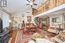 Dining/Living room w/ French doors & large windows -