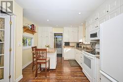 Eat-in kitchen w/ pot lights through out -