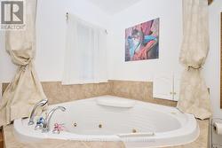 Jacuzzi tub in the 4 piece bath -