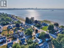 Aerial view of the property w/ proximity to lake -