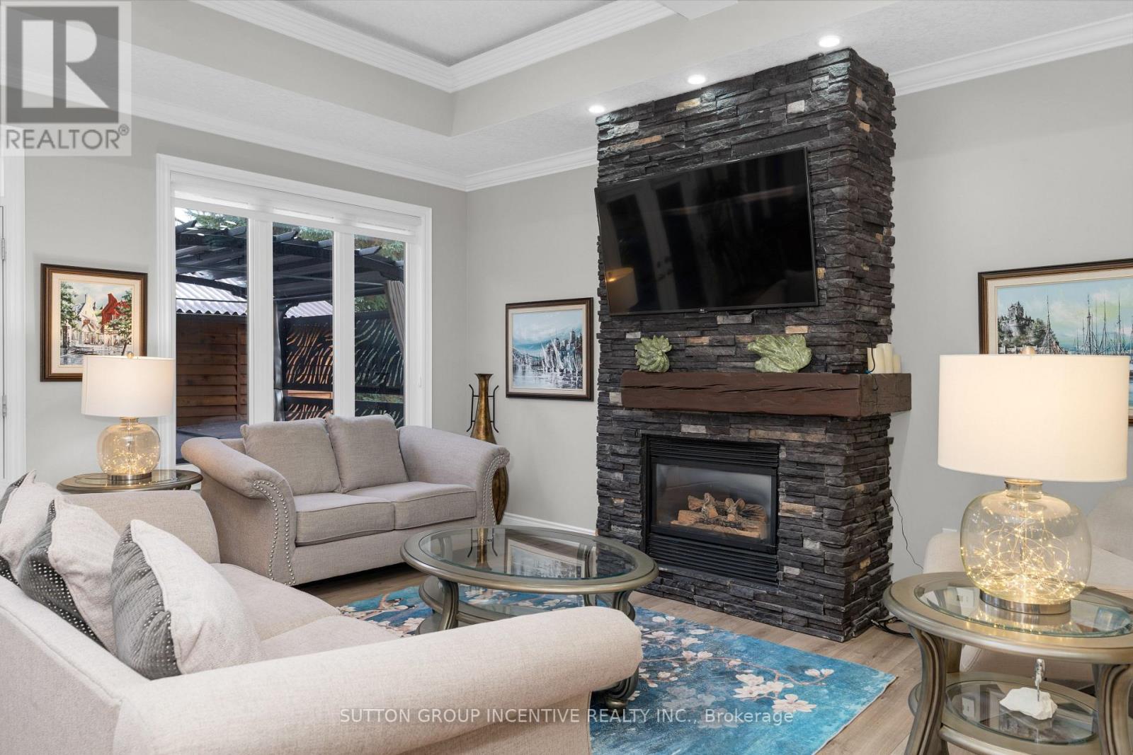 4 Snowshoe Trail, Barrie, ON - Indoor Photo Showing Living Room With Fireplace