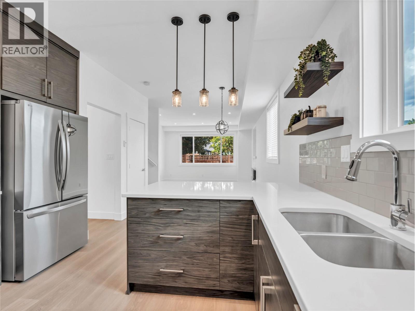 453 Maurice Street Unit# 102, Penticton, BC - Indoor Photo Showing Kitchen With Double Sink