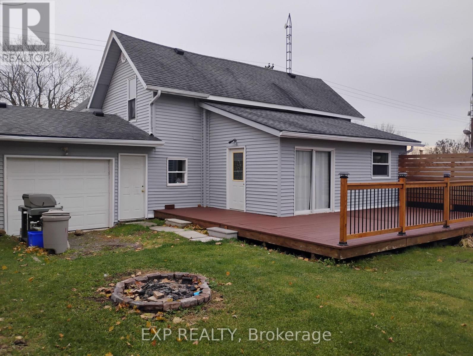 Sliding doors to back yard - 2214 Concession 10 Road, Ramara, ON - Outdoor With Deck Patio Veranda With Exterior