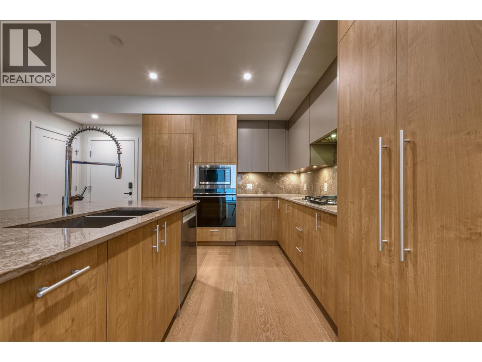 9654 Benchland Drive Unit# 201, Lake Country, BC - Indoor Photo Showing Kitchen With Double Sink With Upgraded Kitchen