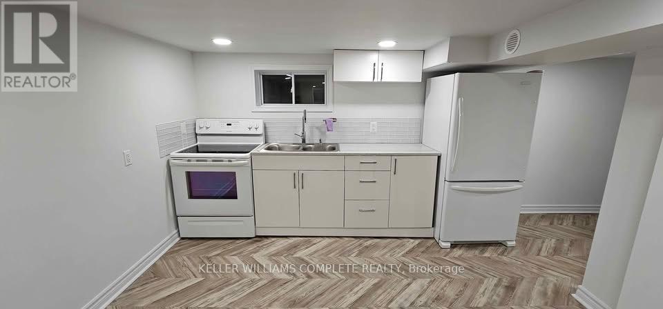 Basement - 6254 Churchill Street, Niagara Falls (Arad/Fallsview), ON - Indoor Photo Showing Kitchen With Double Sink