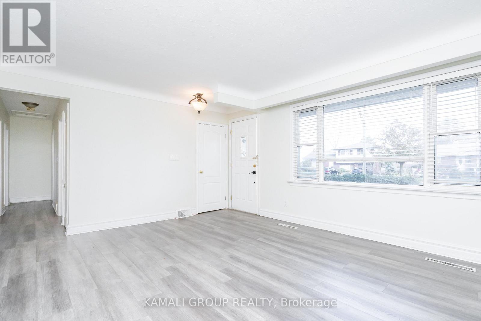 Large Window Overlooks Street - Main - 315 Bunting Road, St. Catharines, ON - Indoor Photo Showing Other Room